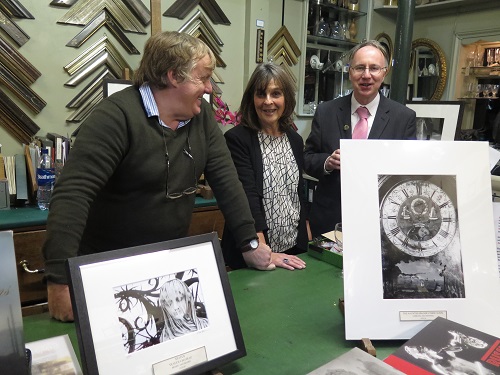 Picture from 2016 Exhibition L-R: Green and Stone owner Roddy Baldwin, Cassie Marsden, Julian Jackson with some of Simon Marsden's Prints. Photo: Julian Jackson